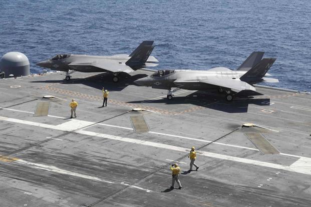 Two F-35C Lightning II aircraft assigned to the Grim Reapers of Strike Fighter Squadron (VFA) 101 sit on the flight deck of the Nimitz-class aircraft carrier USS Abraham Lincoln (CVN 72) on Sept. 4, 2017. The secretary of the Navy says the service has wasted enough money in continuing resolutions to have paid for an entire squadron of the aircraft. Mass Communication Specialist 3rd Class Matt Herbst/Navy