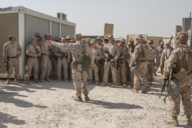 Commandant of the Marine Corps Gen. Robert B. Neller speaks to Marines with Special Purpose Marine Air-Ground Task Force Crisis Response-Central Command at Al Taqaddum, Iraq, on June 17, 2017. (U.S. Marine Corps photo by Cpl. Samantha K. Braun) 