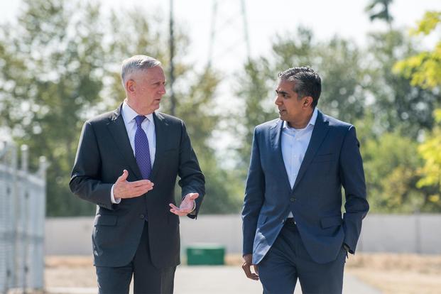 FILE -- Defense Secretary Jim Mattis speaks with Raj Shah, then the managing partner of Defense Innovation Unit Experimental (DIUx), at the organization’s headquarters in Mountain View, Calif., Aug. 10, 2017. (DoD/Air Force Staff Sgt. Jette Carr)
