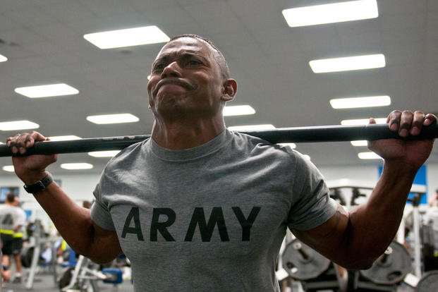 Sgt. Hector Masso, a Binghamton, New York, native and automations section sergeant with Headquarters and Headquarters Troop, 3rd Brigade Combat Team, 1st Cavalry Division, performs weighted squats at the Greywolf Physical Fitness Center Aug. 13 at Fort Hood, Texas. (U.S. Army photo by Sgt. Brandon Banzhaf, 3rd BCT, 1st Cav. Div.)