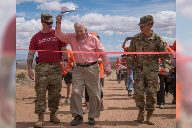 100-year-old Bataan Death March survivor Col. Ben Skardon, a beloved Clemson University alumnus and professor emeritus, crosses the 8.5-mile finish line of the Bataan Memorial Death March at White Sands Missile Range, N.M., March 25, 2018. (Photo: U.S. Army/Ken Scar)