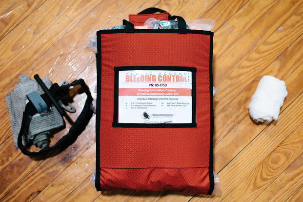 A bleeding control kit is displayed during a bleeding control kit training session at the base theater on Joint Base Andrews, Md., March 29. 2018. The event was a part of the “Stop the Bleed” campaign, which empowers bystanders to understand and implement simple methods to stop or slow life-threatening bleeding, particularly during trauma events. (U.S. Air Force photo by Senior Airman Delano Scott)