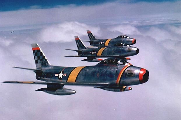 F-86 Sabres from the 51st Fighter Interceptor Wing fly in formation during the Korean War in 1954.  (Courtesy photo) 