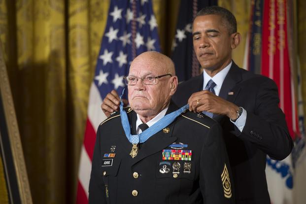 Then-President Barack Obama bestows the Medal of Honor on retired Command Sgt. Maj. Bennie G. Adkins on Sept. 15, 2014. Adkins distinguished himself during 38 hours of close-combat fighting against enemy forces in Vietnam in March 1966. (U.S. Army photo by Staff Sgt. Bernardo Fuller)