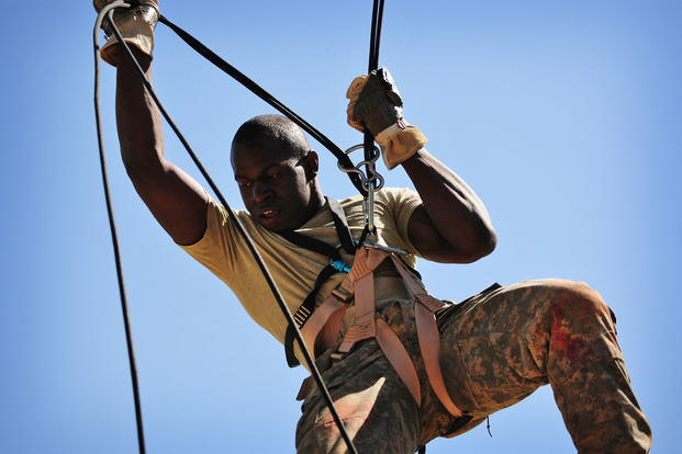 A Ranger fast-ropes down a climb tower during Best Ranger 2011.