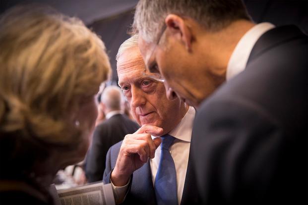 Defense Secretary James N. Mattis confers with leaders during a NATO summit in Brussels, July 12, 2018. (NATO photo)
