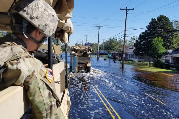 U.S Army Soldiers travel through parts of North Carolina during high water rescue operations in support of the Hurricane Florence Relief effort at Lumberton, North Carolina, Sept. 19, 2018. (U.S. Army photo/Joshua Ford)