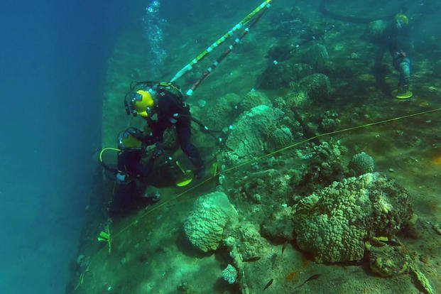 Navy Divers Clear 250,000 Gallons of Oil from Captured WWII Nazi Ship ...