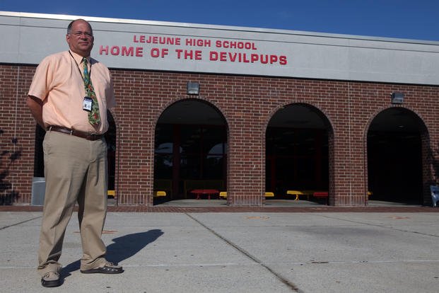 Camp Lejeune High School Principal Eric Steimel stands in front of the school in this 2011 file photo. (U.S. Marine Corps/Bryan A. Peterson)