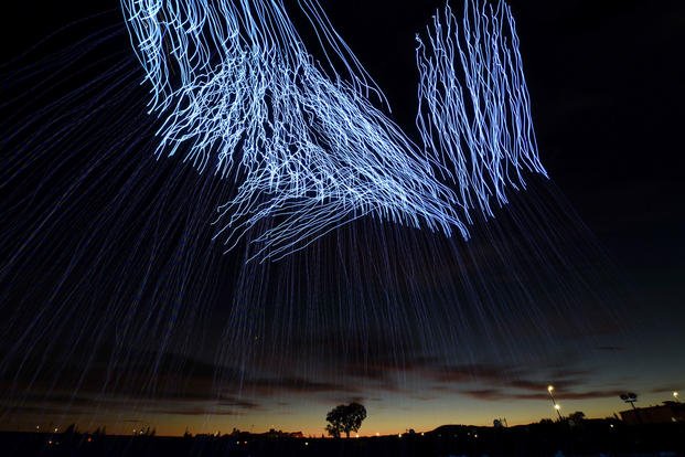 More than 500 drones illuminate the sky during a light show at Travis Air Force Base, Calif., July 5, 2018. Air Force photo by Airman 1st Class Christian Conrad