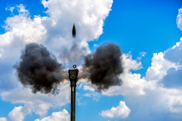 A howitzer round shoots into the air as soldiers assigned to the 4th Battalion, 319th Airborne Field Artillery Regiment conduct training in Grafenwoehr, Germany, July 25, 2018. (U.S. Army photo by Army Spc. Josselyn Fuentes)