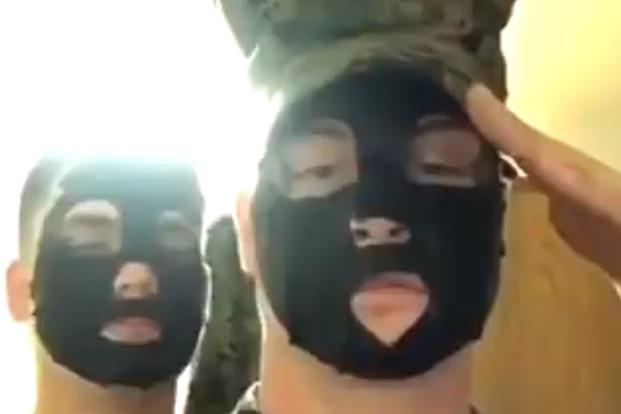 Screenshot shows two Marines in alleged blackface video. (Screenshot of video via Twitter)
