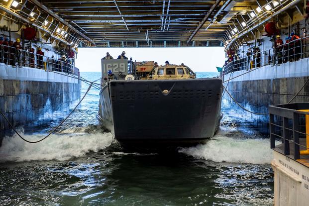 Landing Craft, Utility (LCU) 1629, assigned to Beachmaster Unit (BMU) 1, docks with the San Antonio-class amphibious transport dock ship USS Somerset (LPD 25) during Pacific Blitz 2019. Pacific Blitz 2019 is an opportunity for U.S. Forces to increase maritime readiness to be prepared for real-world crisis situations. Pacific Blitz 2019 provides realistic, relevant training necessary for effective global crisis response expected of the Navy and Marine Corps. (Heath Zeigler/U.S. Navy)