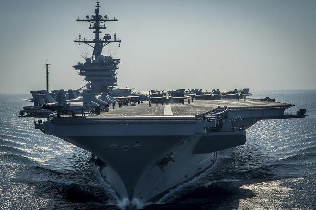 The Nimitz-class aircraft carrier USS Carl Vinson (CVN 70) prepares for flight operations in the Arabian Gulf. Carl Vinson is deployed in the U.S. (U.S. Navy/Mass Communication Specialist 2nd Class Alex King)