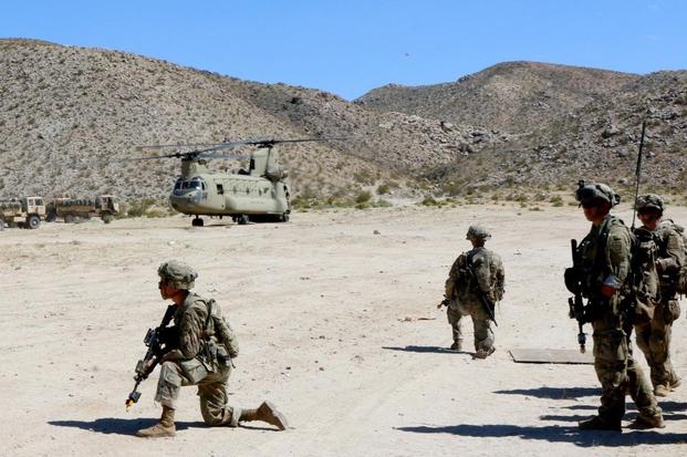 Soldiers from the 82nd Airborne Division, attached to the 3rd Infantry Division’s 2nd Armored Brigade Combat Team at the National Training Center, Fort Irwin California, pull security for civil affairs teams from the 448th Civil Affairs Battalion out of Joint Base Lewis-McChord, Washington. (Matthew Cox/Military.com)