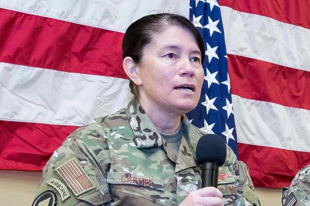 U.S. Air Force Col. Brenda Cartier, AFSOC director of operations, speaks during the Air Commando Association heritage symposium women’s panel at Hurlburt Field, Florida, Dec. 7, 2018 (U.S. Air Force/Courtesy photo)