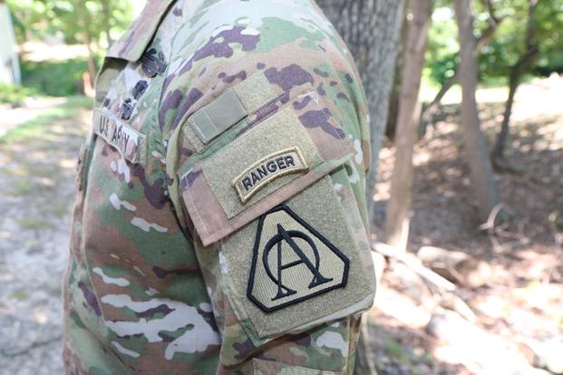 The Army’s new Improved Hot Weather Combat Uniform features shoulder pockets with buttoned-flap closures, similar to the original Army Combat Uniform design. (Matthew Cox/Military.com)