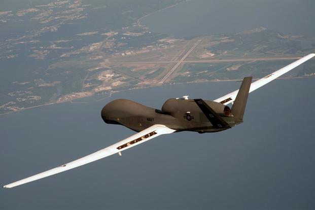 A file photo dated June 25, 2010 of an RQ-4 Global Hawk unmanned surveillance and reconnaissance aircraft flying over Patuxent River, Md. (U.S. Air Force)