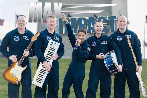 Members of the Air Force Band’s rock band Max Impact pose for a promotional photograph. (U.S. Air Force/ Grant Langford)