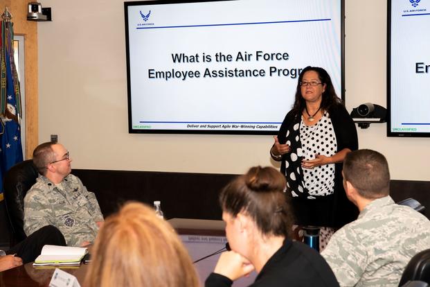 Danna Plewe, Air Force Employee Assistance Program Manager, briefs personnel on the benefits of the EAP, at Schriever Air Force Base, Colorado, Aug. 7, 2019. The EAP is a professional service which provides problem-solving, coaching, information, consultation, counseling, resource identification and support to all civilian and non-appropriated fund employees. (Matthew Coleman-Foster/U.S. Air Force)
