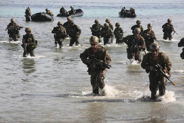 Philippine and U.S. Marines simulate a beach landing from combat rubber raiding crafts onto a small island off the coast of Palawan, Philippines, Oct. 2 during Amphibious Landing Exercise 2015. (U.S. Marine Corps/Sgt. Anthony J. Kirby)