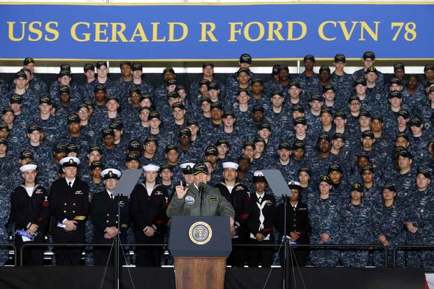President Donald J. Trump speaks with Sailors in the hangar bay aboard Pre-Commissioning Unit Gerald R. Ford (CVN 78). (U.S. Navy/Mass Communication 1st Class Joshua Sheppard)