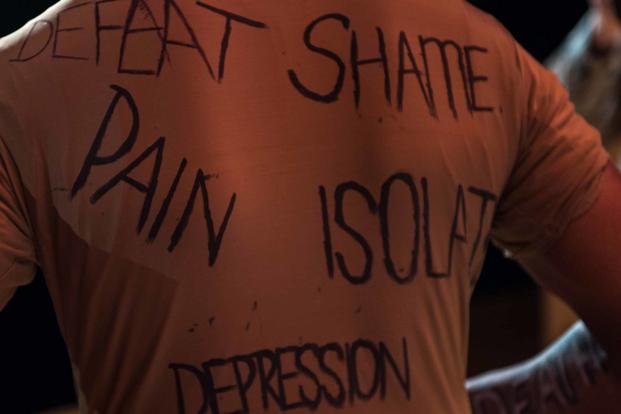 The Sexual Assault Theater Group displays negative emotions written on a simulated sexual assault victim while rehearsing the play "Everybody Knows" at Joint Base Langley-Eustis, Virginia, on April 9, 2019. (U.S. Air Force photo by Senior Airman Anthony Nin Leclerec)