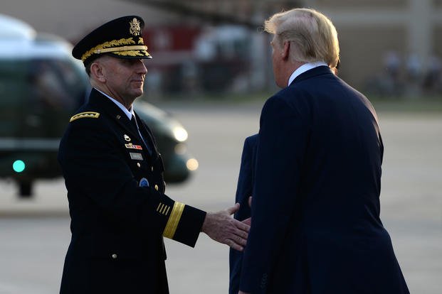 Army Gen. Robert Abrams greets Trump Osan Air Base