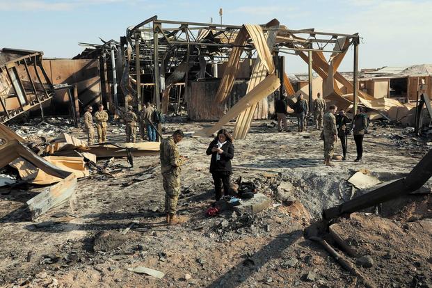 Media outlets visit one of the many impact sites created by the recent missile attacks at Al Asad Air Base, Iraq, Jan. 13, 2020. (U.S. Army/Spc. Derek Mustard)