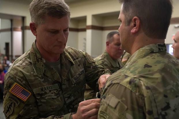 7th Special Forces Group soldier receives award.
