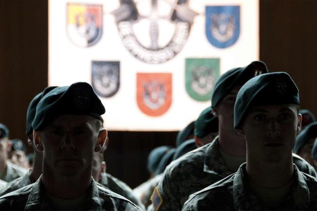 Special Forces Soldiers during their Special Forces Qualification Course graduation ceremony.