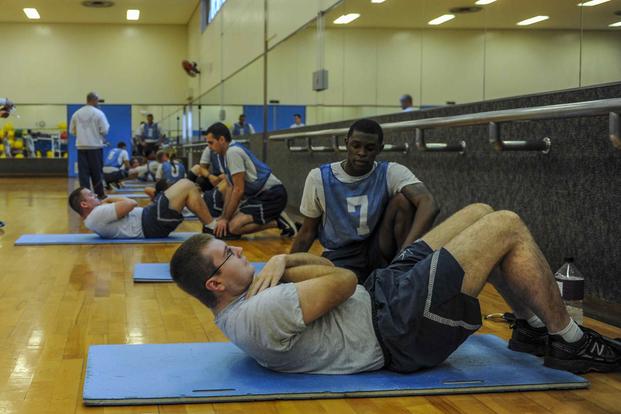 Airmen participate in a physical fitness test on Kadena Air Base.