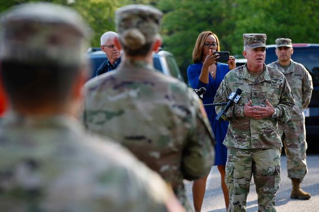 Col. Daniel Moore says farewell to his troops before they load transportation from Fort Bragg, N.C. on April 7, 2020, to the Javits Convention Center in New York City.