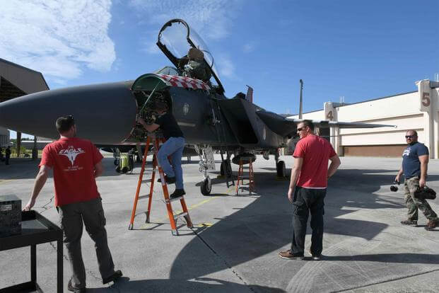 The 561st Aircraft Maintenance Squadron receive one of two F-15 aircraft from the 48th Fighter Wing.