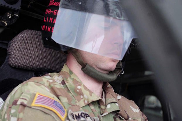 Army pilot wearing a visor