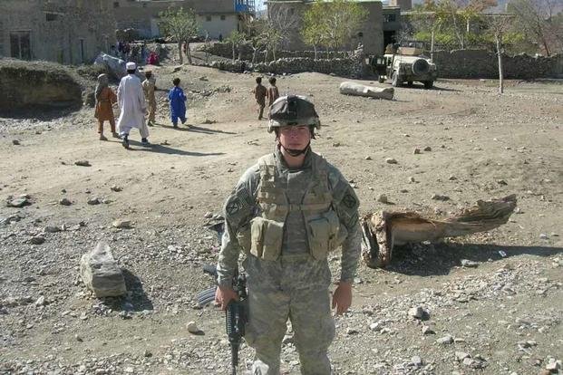 Army veteran Robert Pinholt, who deployed in 2006 and '07, is shown in Afghanistan with the 10th Mountain Division. 