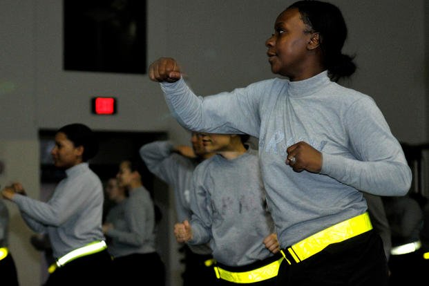 Postpartum soldiers perform aerobic exercises on Fort Hood, Texas.
