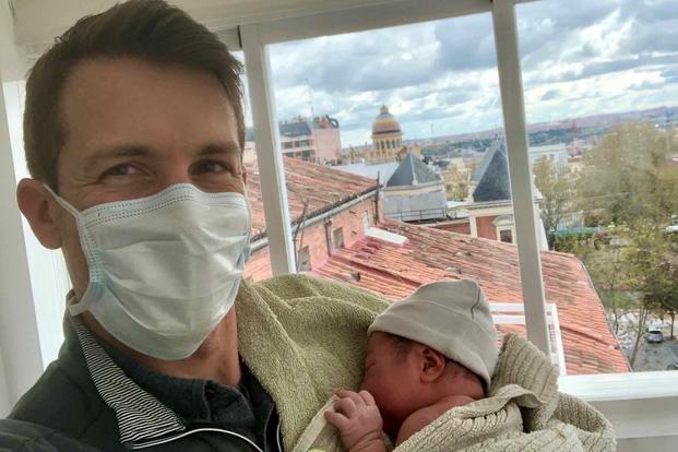 Air Force Major Chris Stein, with baby Sadie.