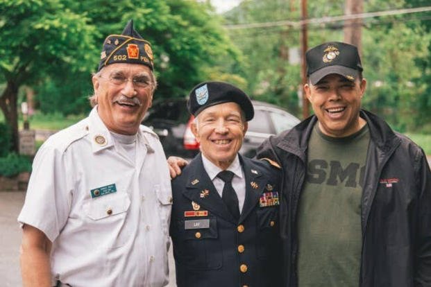 Three Veterans smiling
