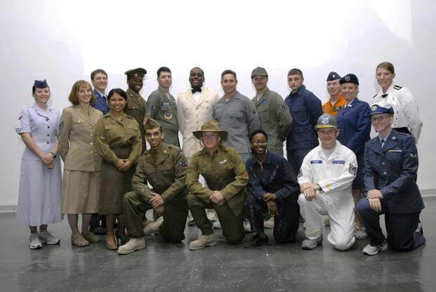 Group shot of Airmen featuring historical Air Force uniforms.
