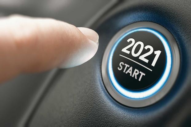 Start button of an automobile with the year 2021 printed on it 