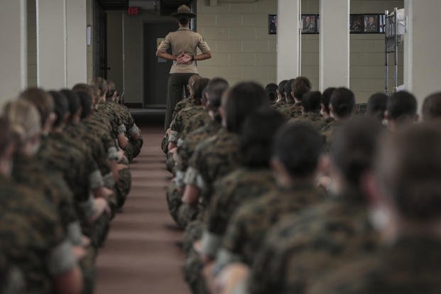 Drill instructors with Papa Company, 4th Recruit Training Battalion set the tone for their new recruits during forming day one at Marine Corps Recruit Depot Parris Island, S.C. May 22, 2020. 