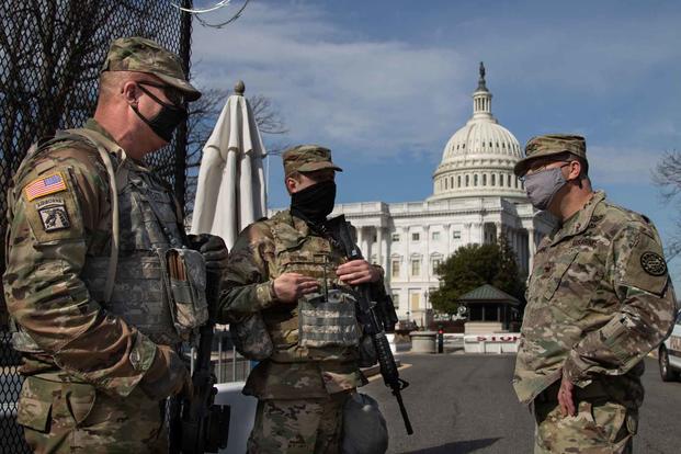 U.S. Army Col. Chris McKinney speaks with soldiers in Washington, D.C.