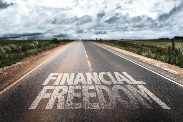 Graphic of highway with "Financial Freedom" superimposed on pavement.