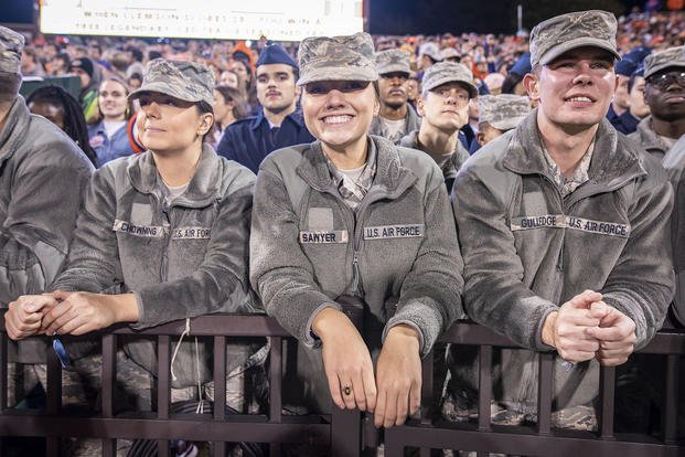 Air Force ROTC Cadets cheering at military football game