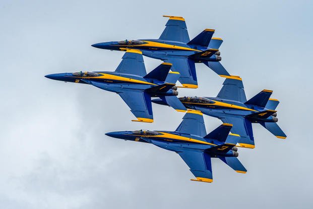 Blue Angels perform the Diamond 360 maneuver over Orlando Melbourne International Airport