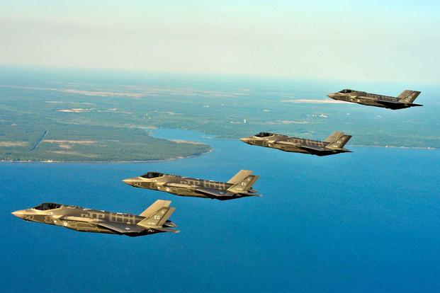 U.S. Air Force F-35A Lightning II Joint Strike Fighters perform an aerial refueling mission