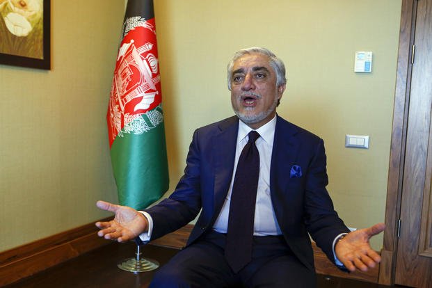 The head of Afghanistan's National Reconciliation Council gestures.
