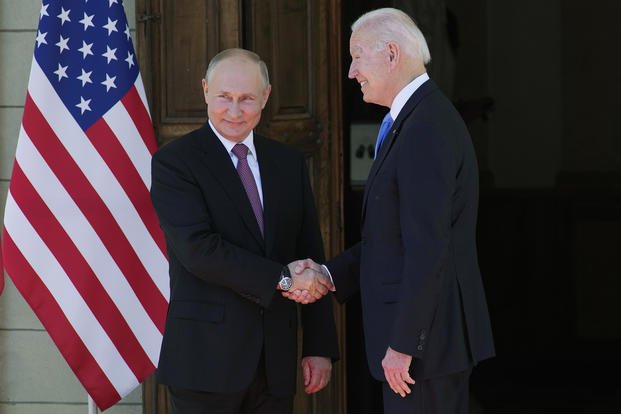 Vladimir Putin, Joe Biden shake hands