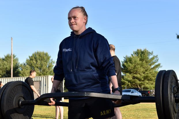 Staff Sgt. Kelsey Stanfill conducts the 3 Repetition Maximum Deadlift during the Army Combat Fitness Test